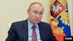 Владимир Путин во время видеоконференции 26 января 2022 года. Фото: ТАСС