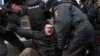 RUSSIA -- Police officers detain a demonstrator after the Free Internet rally in response to a bill making its way through parliament calling for all internet traffic to be routed through servers in Russia, in Moscow, March 10, 2019