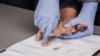 police takes fingerprints of a criminal. law concept