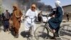 AFGHANISTAN -- Smoke rises after fighting between the Taliban and Afghan security personnel, in Kandahar, August 12, 2021